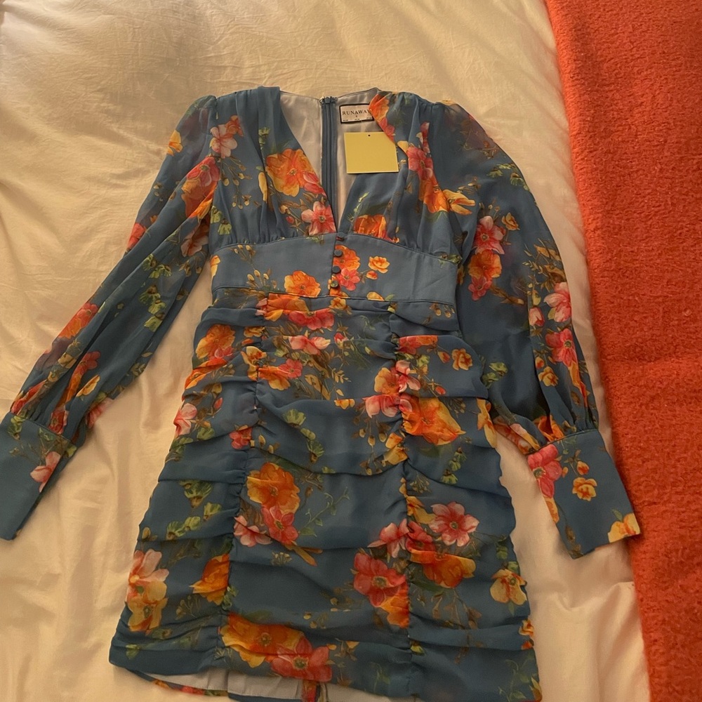Brand new unique floral dress, still has the tags and never worn
